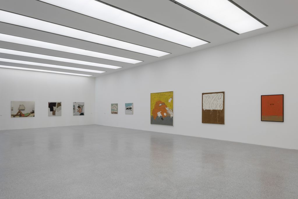 Exhibition room with two-dimensional works by the artists Michelangelo Pistoletto and Mario Schifano hanging on the white walls. Sammlung Goetz Munich