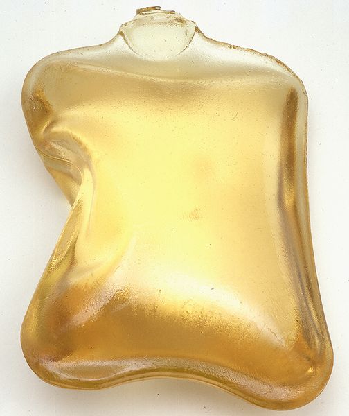 This photograph contains a synthetic resin cast of the inside of a hot water bottle.