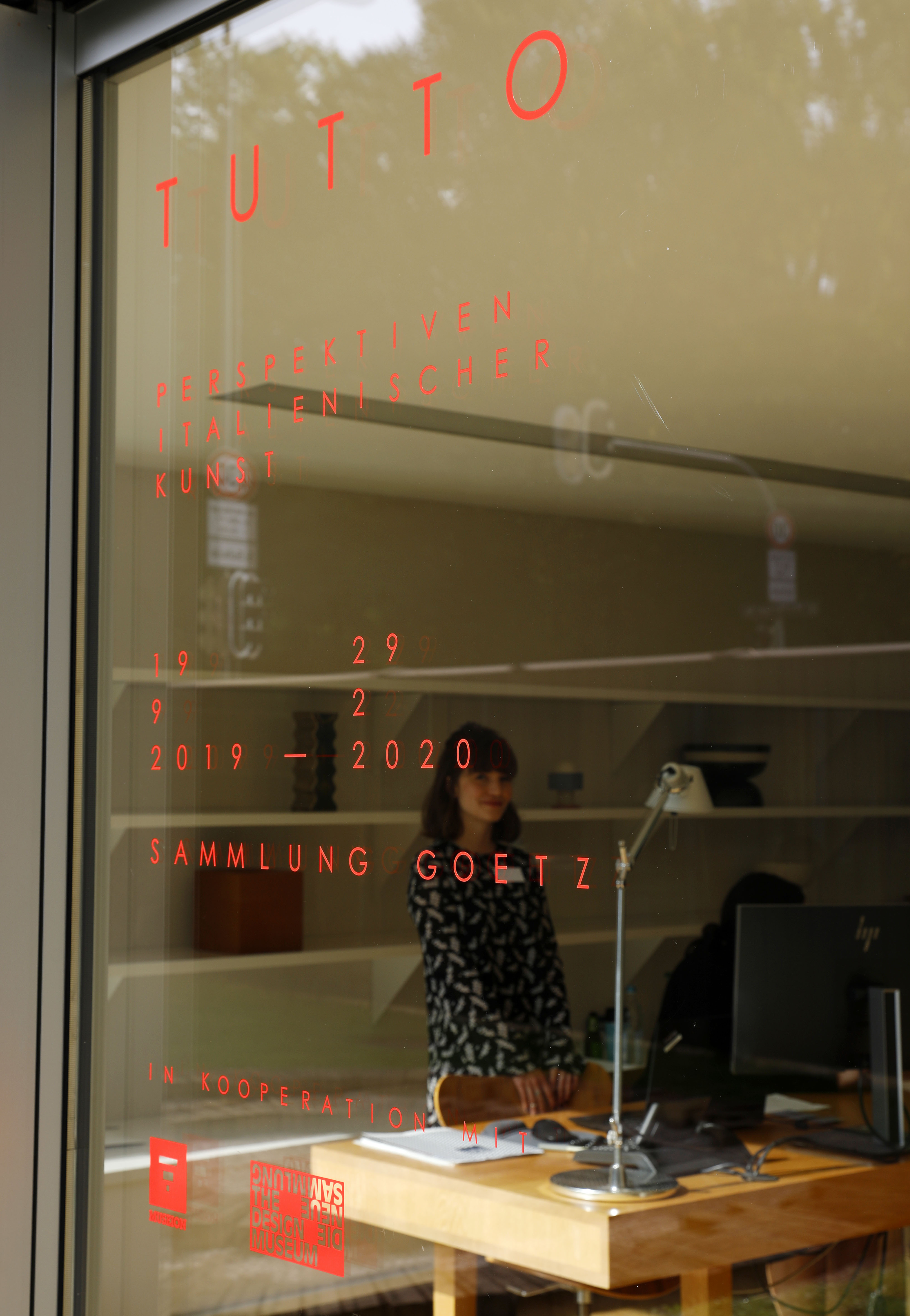 An employee of the Sammlung Goetz in the entrance area of the exhibition building