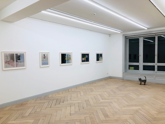 Exhibition space with monotypes by Zilla Leutenegger on the wall