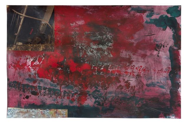 An abstract composition with predominantly red, black, and green colour fields. The surface shows varied textures, including brush and roller marks. In the upper left area, there is a small photographic element depicting mechanical details.