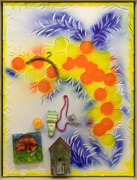 Painting on a base of styrofoam, consisting of a floral motif in orange and blue. Mounted on it are objects such as a coat hanger, a bird house, etc. Andreas Slominski, Sammlung Goetz Munich